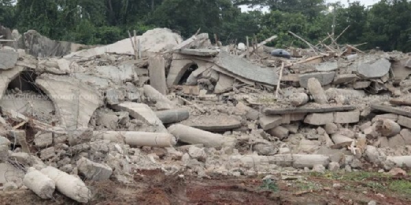 At Winneba, a 3-story structure collapses, yet more than 15 occupants survive.
